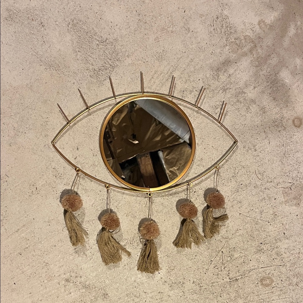 Gold Eye Wall Mirror with Tassels
